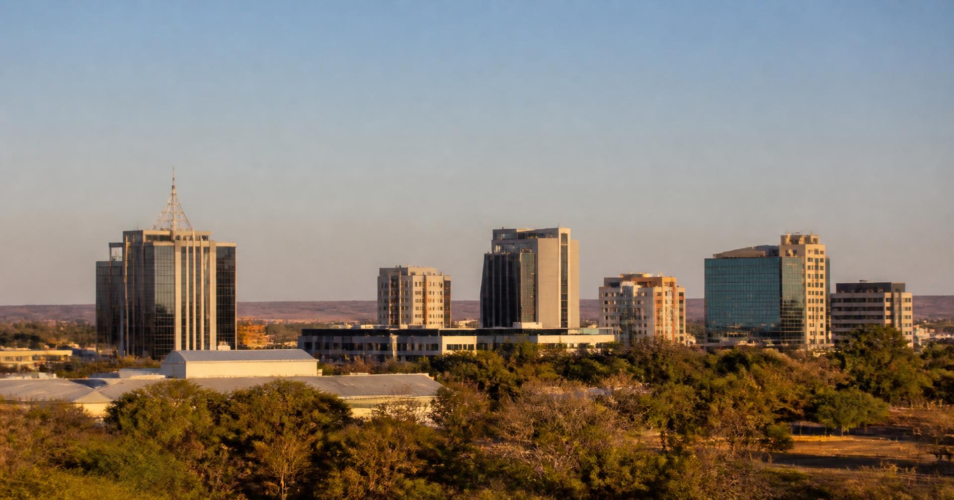 The Gaborone central business district skyline at golden hour